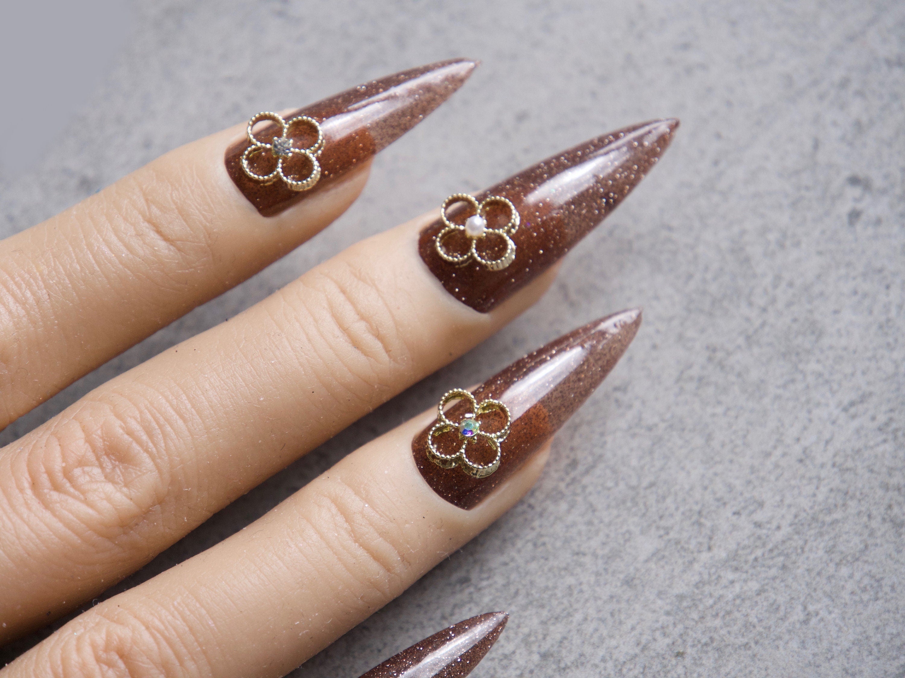 Amazing 3d Flower nail art design on tinted glass nails. Stock Photo |  Adobe Stock